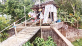 বড়লেখায় সেতুর ওপর দোকান